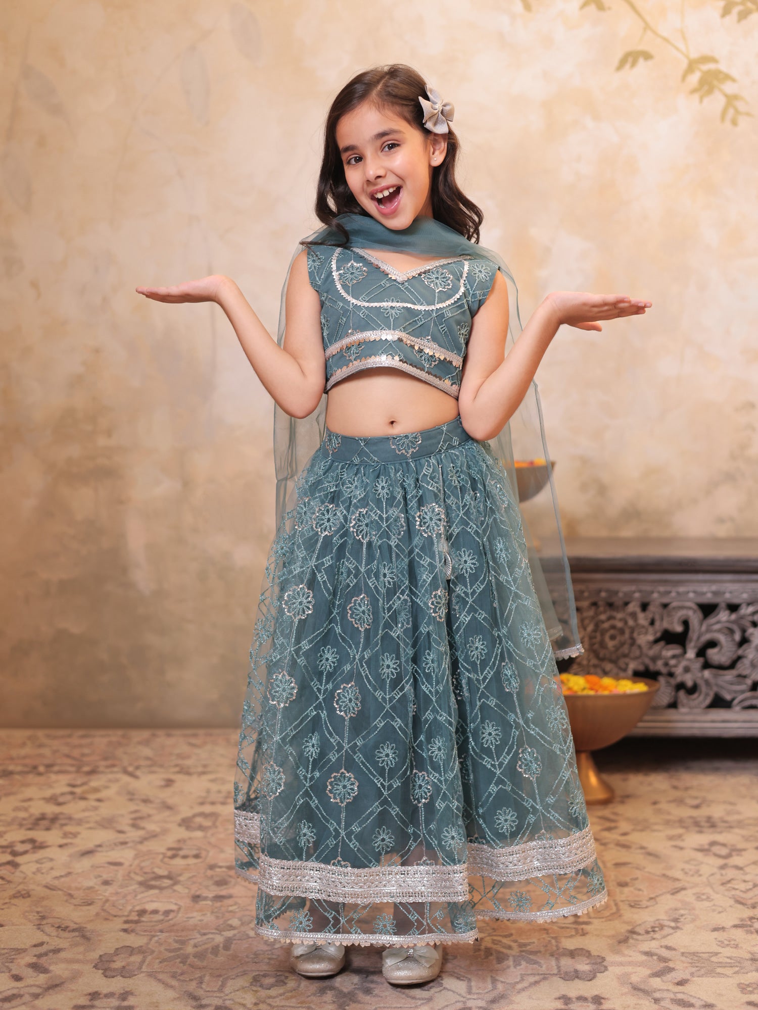 Girls Teal Net Sleeveless Heavy Embroidered Lehenga Choli