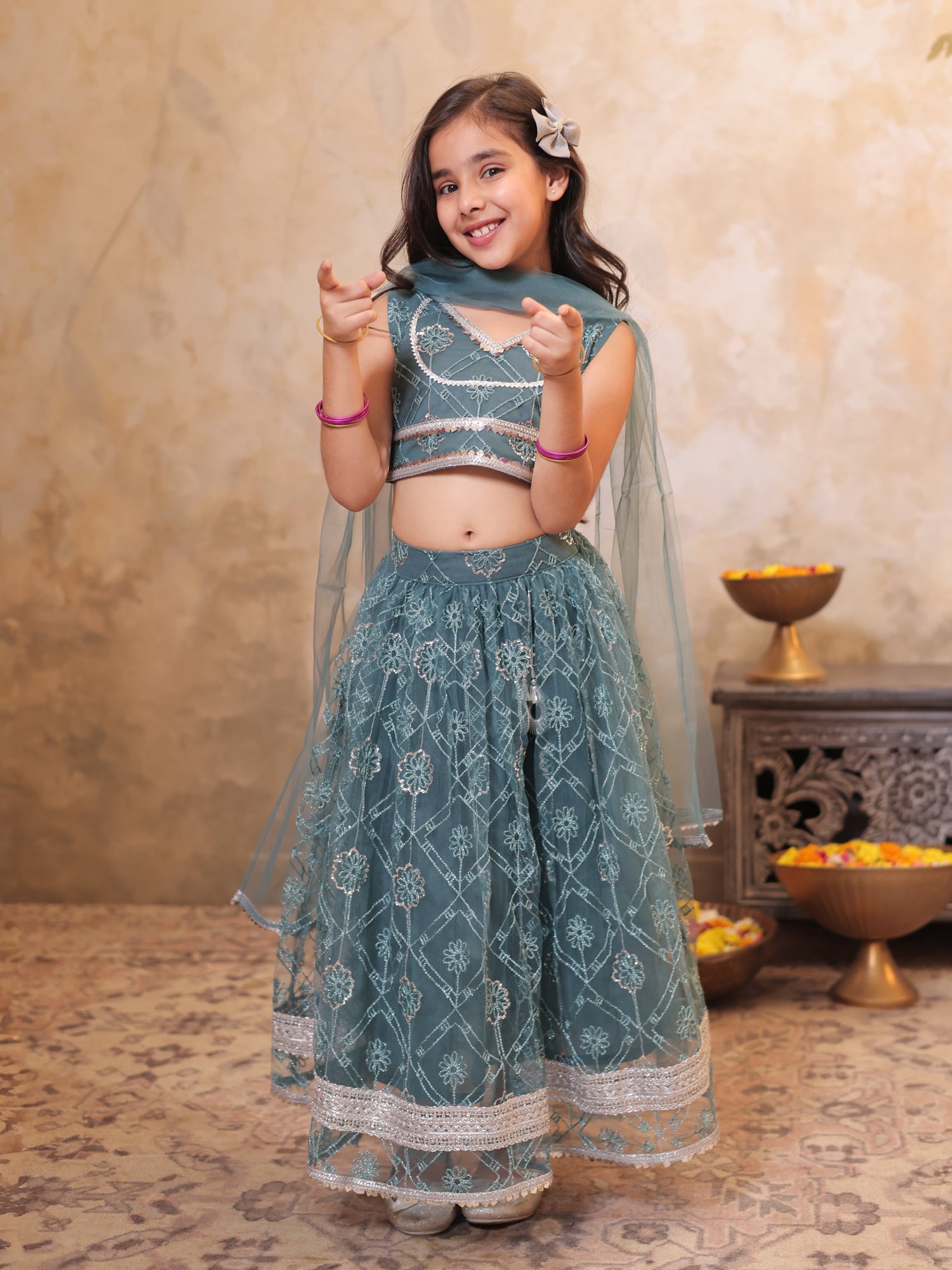 Girls Teal Net Sleeveless Heavy Embroidered Lehenga Choli