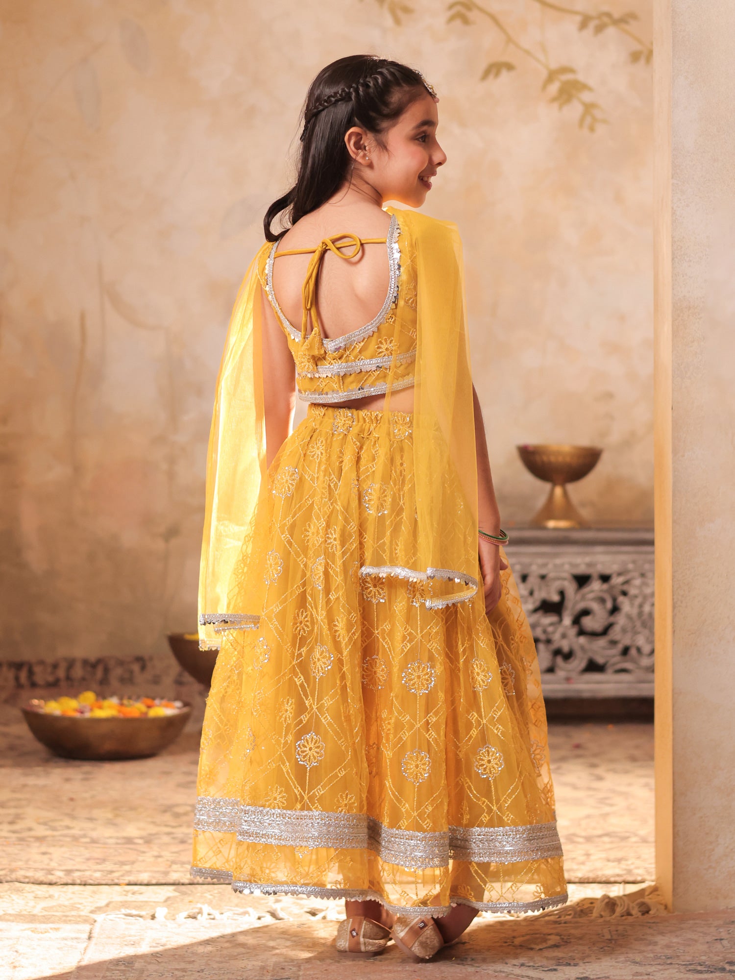 Girls Yellow Net Sleeveless Heavy Embroidered Lehenga Choli
