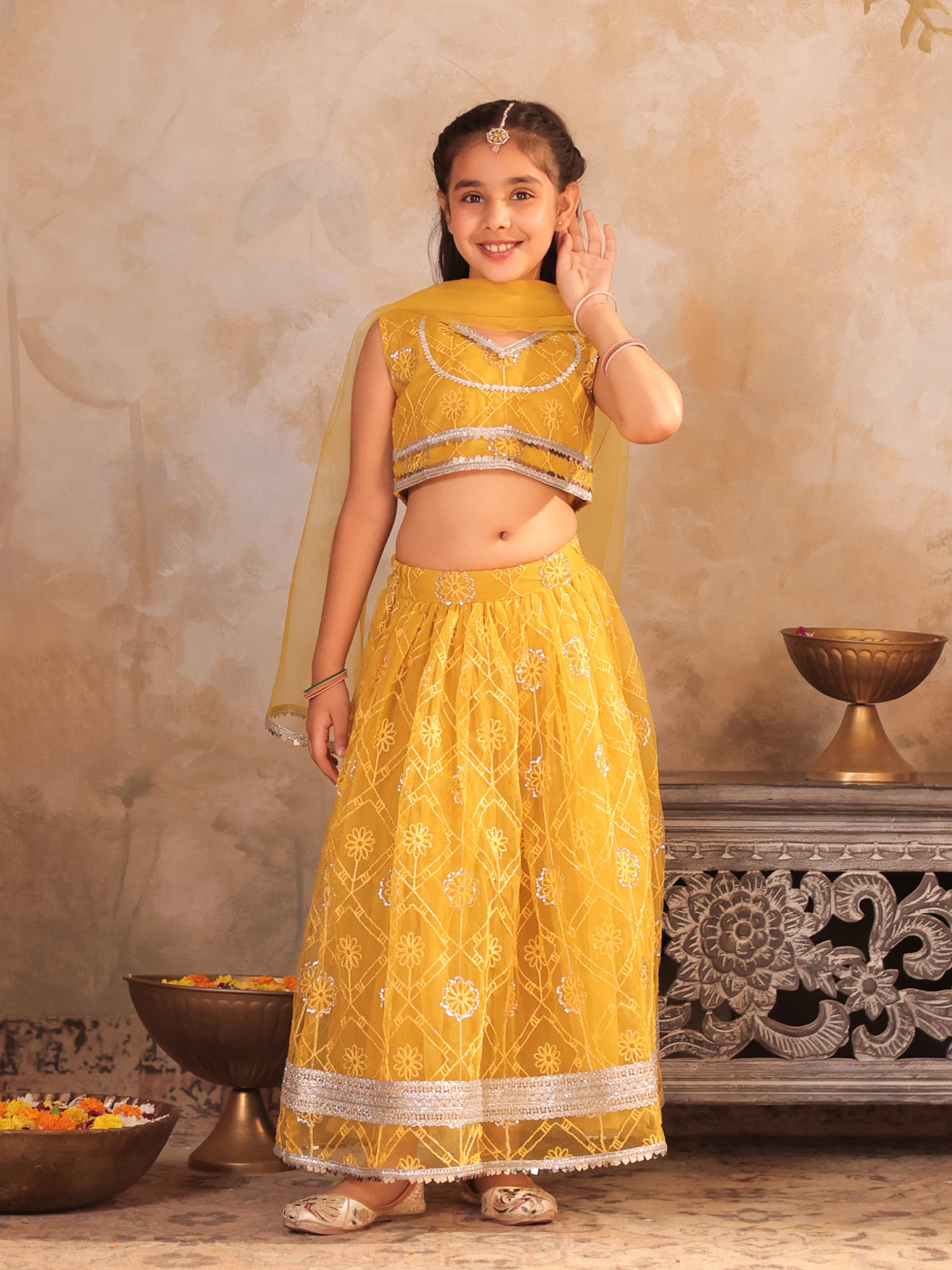 Girls Yellow Net Sleeveless Heavy Embroidered Lehenga Choli