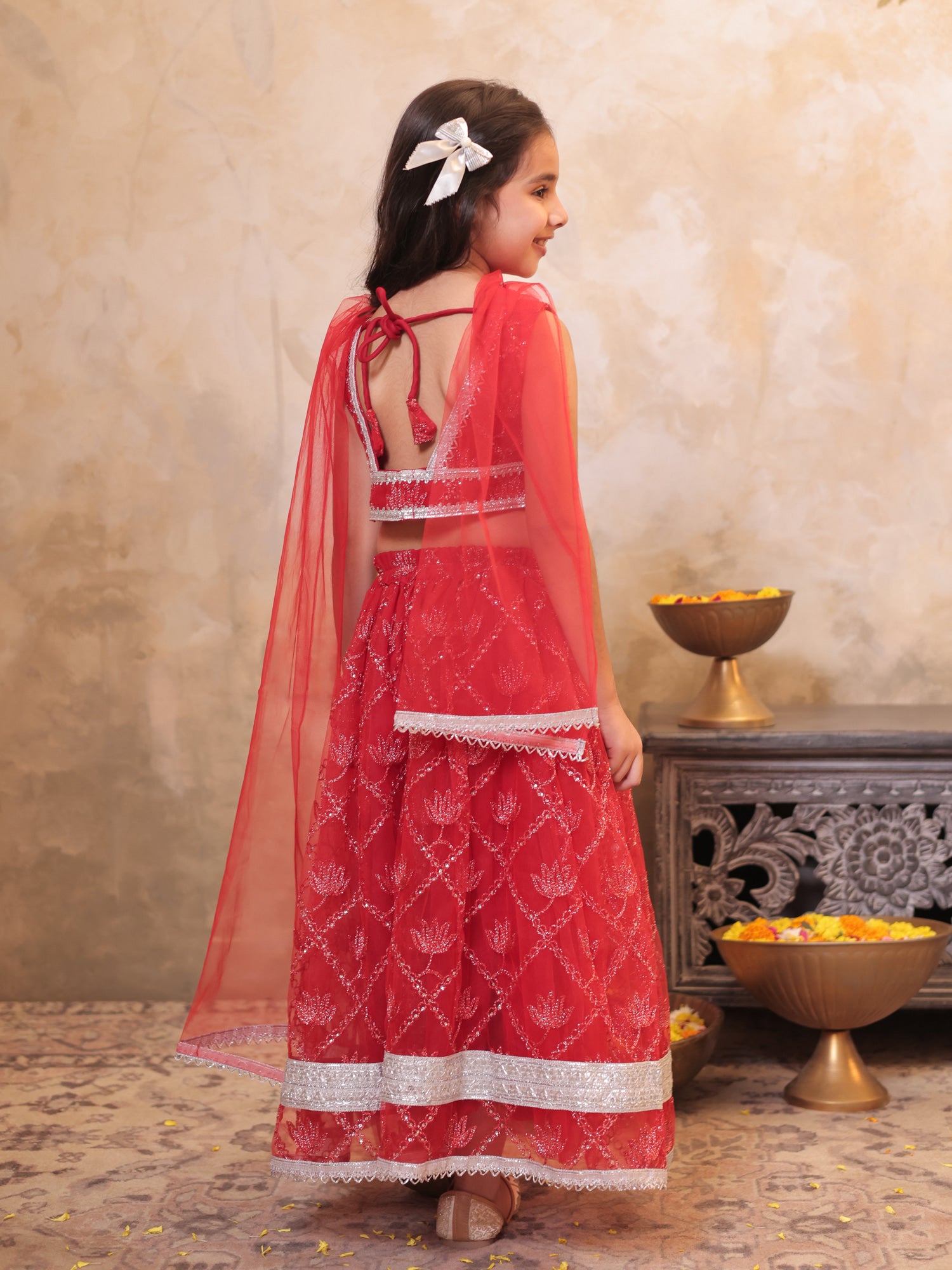 Girls Red Net Sleeveless Heavy Embroidered Lehenga Choli